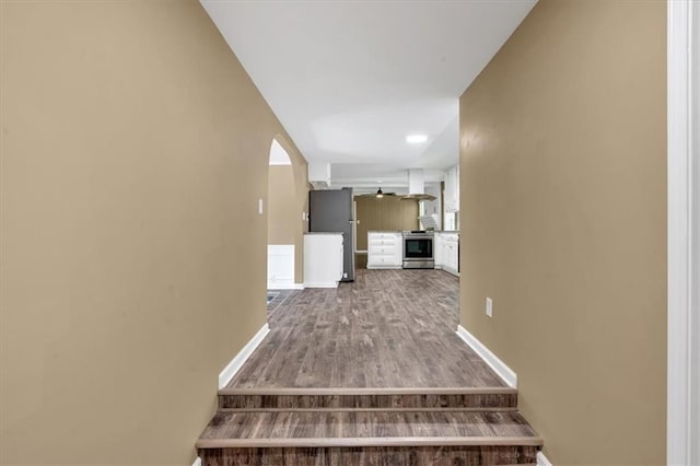 hall with hardwood / wood-style floors