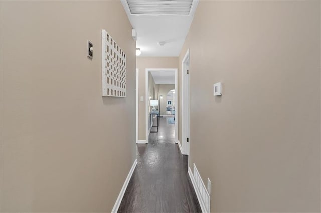 hall with dark hardwood / wood-style floors