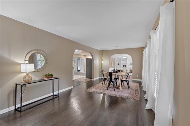 dining area featuring dark hardwood / wood-style flooring