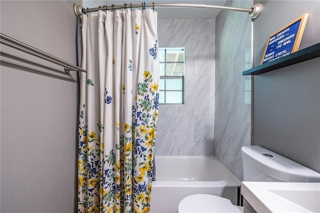 bathroom with shower / tub combo with curtain and toilet