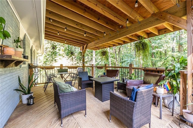 wooden deck featuring outdoor lounge area