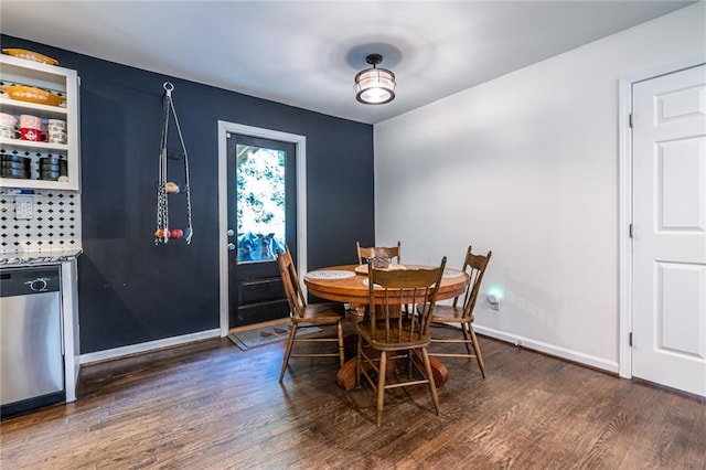 dining space with dark wood-type flooring