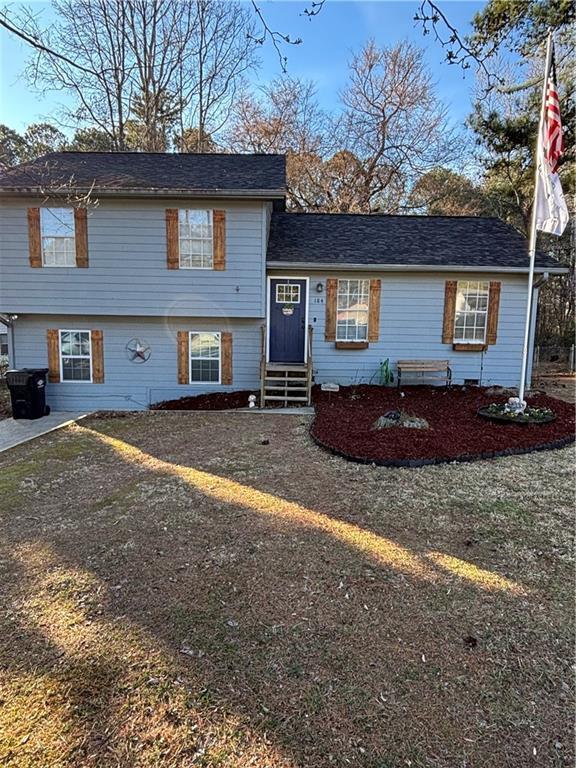 tri-level home featuring entry steps