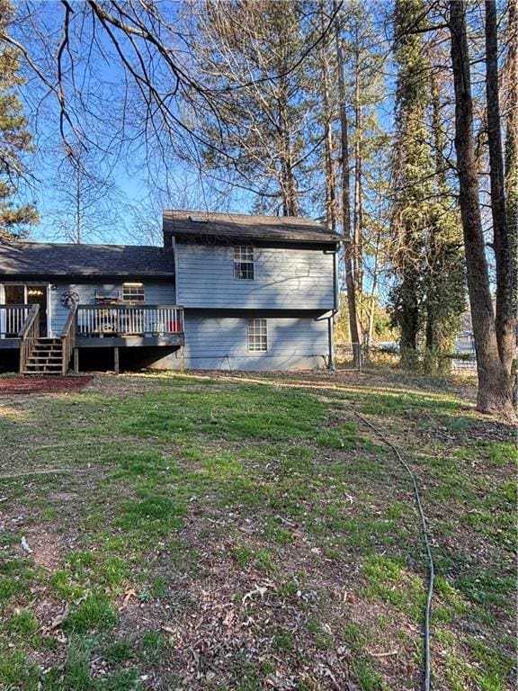 exterior space featuring a yard and a deck