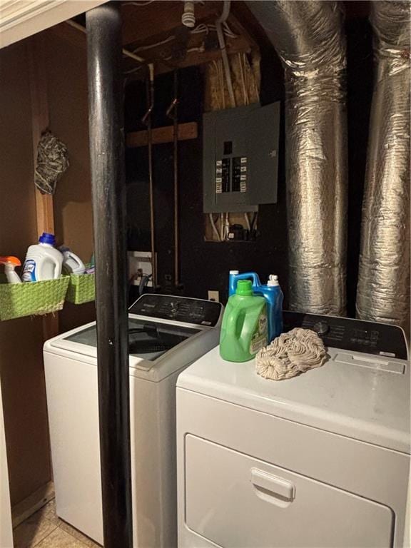 laundry area featuring laundry area, separate washer and dryer, and electric panel