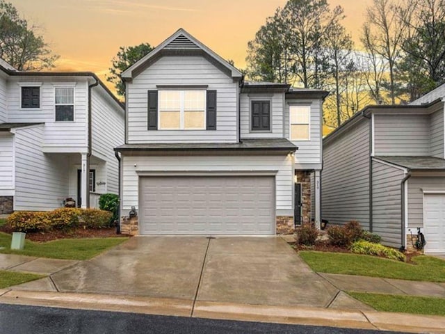 view of front of property featuring a garage