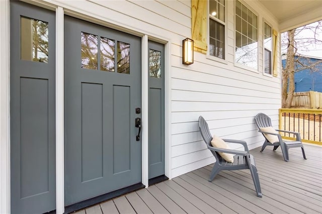 entrance to property with covered porch