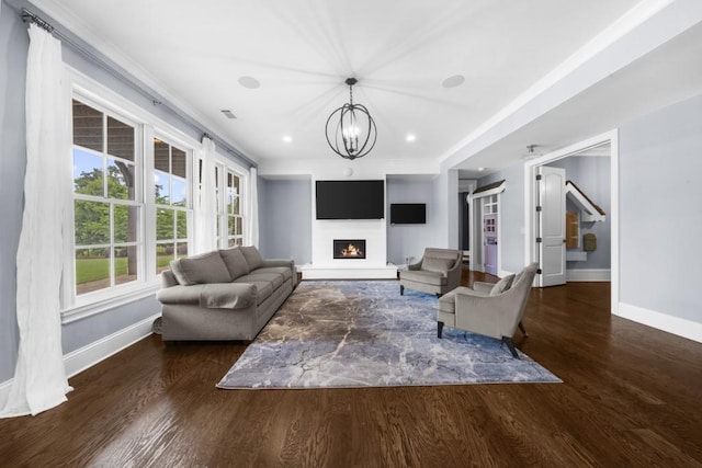 10150 Cedar Ridge Dr, Milton, GA 30004 - living room with wood finished floors, a lit fireplace, a chandelier, and recessed lighting