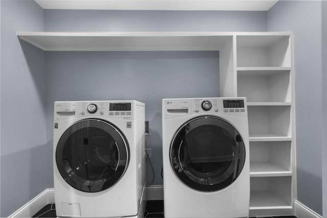 10150 Cedar Ridge Dr, Milton, GA 30004 - laundry room featuring independent washer and dryer and tile patterned flooring