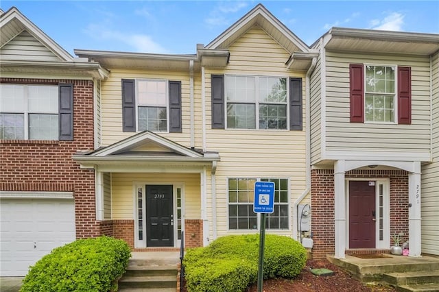 multi unit property featuring brick siding