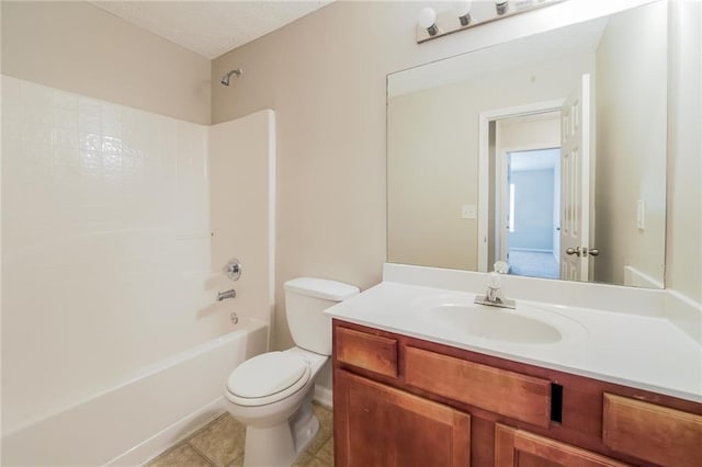 bathroom featuring shower / washtub combination, tile patterned flooring, vanity, and toilet