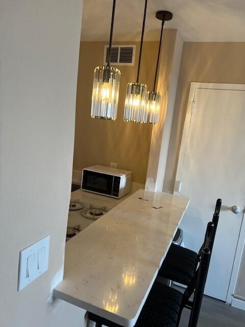 dining area featuring an inviting chandelier