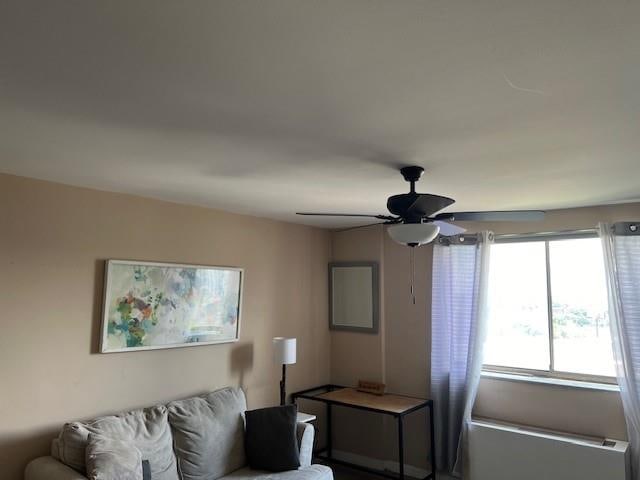 living room featuring ceiling fan