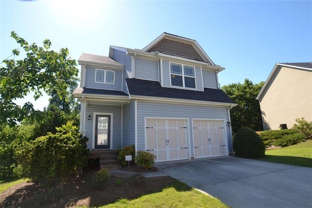 view of front of property with a garage