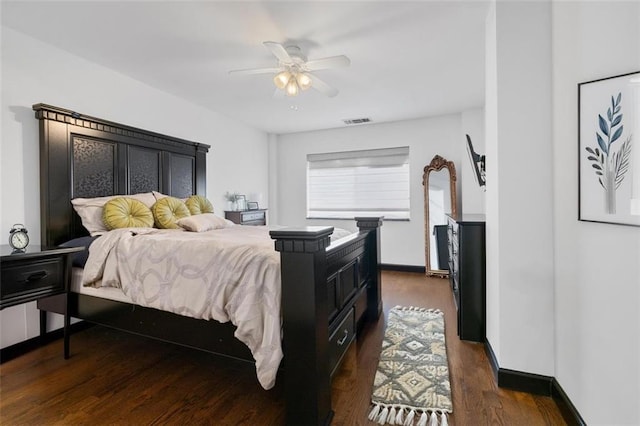 1501 Clairmont Rd Unit 1027, Decatur, GA 30033 - bedroom with dark wood-type flooring, visible vents, ceiling fan, and baseboards