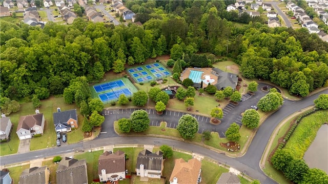 aerial view of property's location with nearby suburban area
