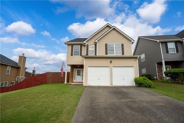 view of front of home featuring asphalt driveway and an attached garage
