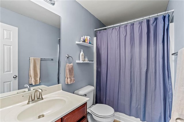 full bathroom with toilet, vanity, and a shower with curtain