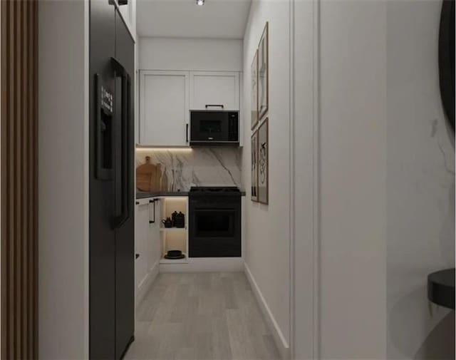 hallway featuring light hardwood / wood-style flooring