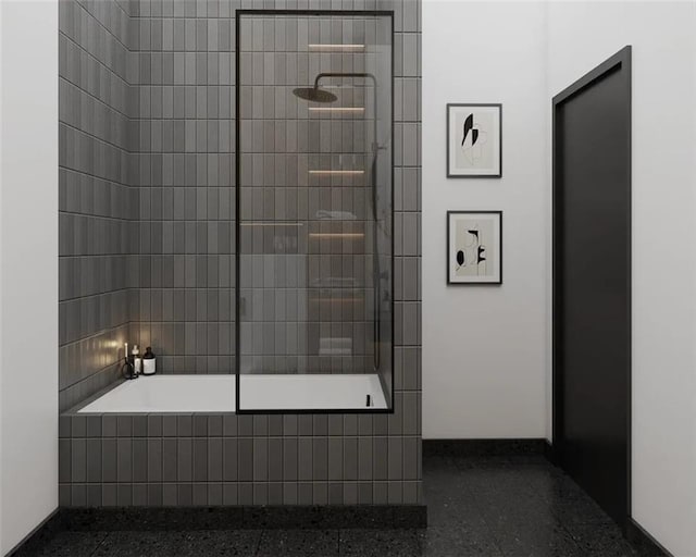 bathroom featuring tiled shower / bath combo