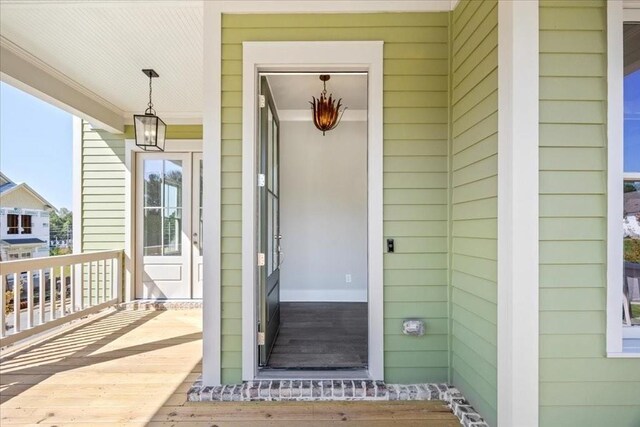 entrance to property with covered porch