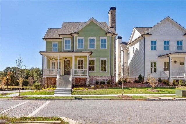 view of front of home featuring covered porch