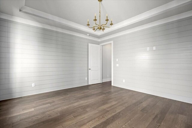 living room with a tiled fireplace, beamed ceiling, light hardwood / wood-style floors, and a notable chandelier