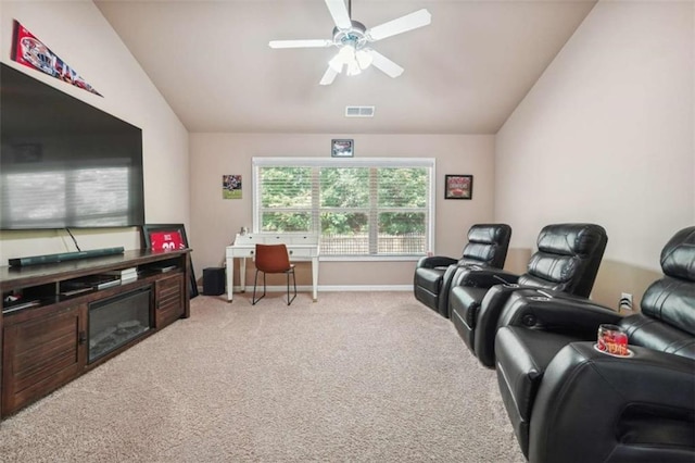 1249 Austin Thomas Dr, Dacula, GA 30019 - home theater with a ceiling fan, vaulted ceiling, carpet flooring, and visible vents