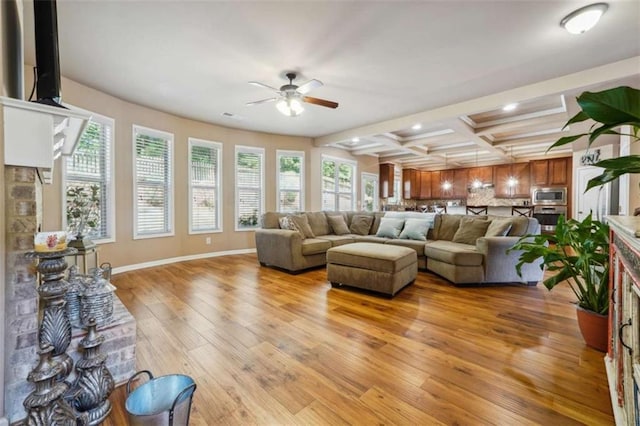 1249 Austin Thomas Dr, Dacula, GA 30019 - living area featuring beam ceiling, ceiling fan, recessed lighting, light wood-type flooring, and coffered ceiling
