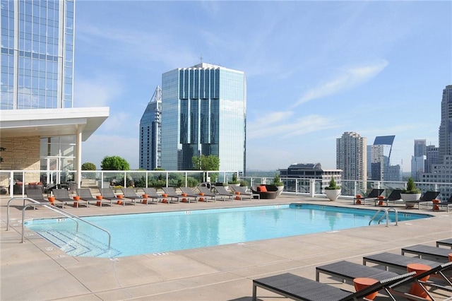 view of swimming pool featuring a patio