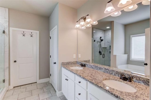 bathroom with tile patterned flooring, plus walk in shower, and vanity