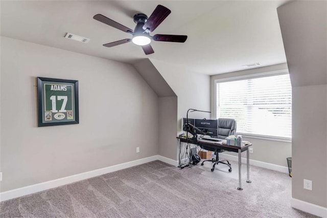 office area featuring light carpet, lofted ceiling, and ceiling fan