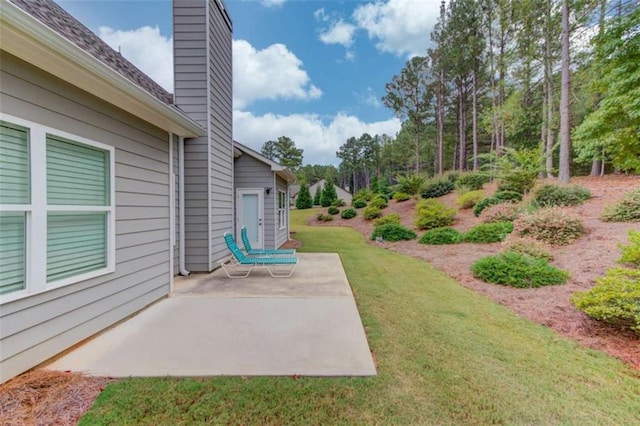 view of yard with a patio area