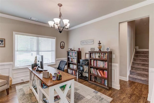 home office with a notable chandelier, crown molding, and dark wood-type flooring