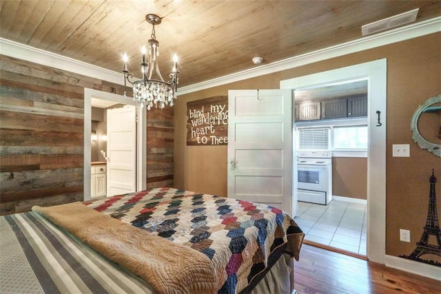 245 Alcovy St, Monroe, GA 30655 - bedroom with wooden ceiling, crown molding, wood walls, and a chandelier