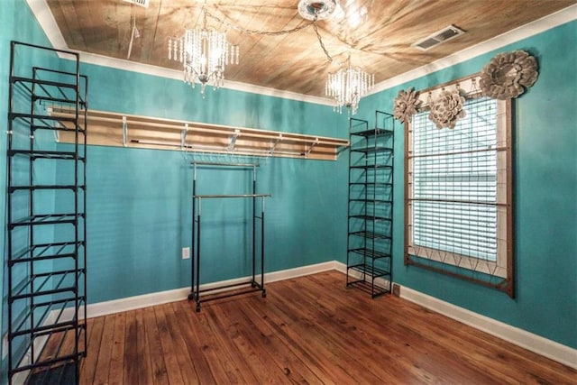 245 Alcovy St, Monroe, GA 30655 - empty room with wooden ceiling, wood-type flooring, and a notable chandelier