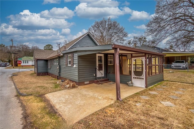 245 Alcovy St, Monroe, GA 30655 - bungalow featuring a front yard and a carport