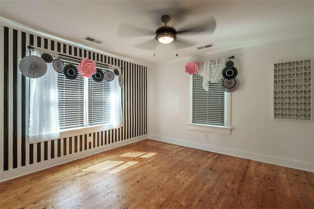245 Alcovy St, Monroe, GA 30655 - spare room with crown molding, hardwood / wood-style floors, and ceiling fan