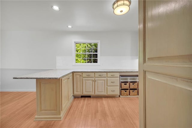 4331 E Kings Point Cir, Dunwoody, GA 30338 - kitchen with light brown cabinetry, light wood-style flooring, a peninsula, recessed lighting, and light stone counters
