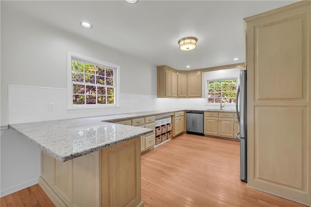 4331 E Kings Point Cir, Dunwoody, GA 30338 - kitchen with stainless steel appliances, a peninsula, light brown cabinetry, backsplash, and recessed lighting