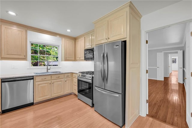 4331 E Kings Point Cir, Dunwoody, GA 30338 - kitchen featuring stainless steel appliances, a sink, light brown cabinetry, ornamental molding, and recessed lighting