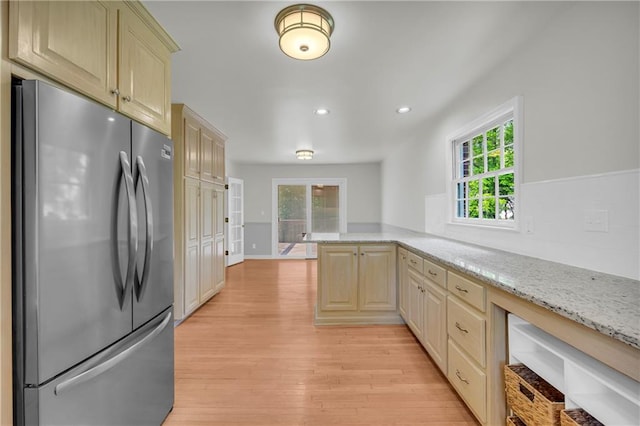 4331 E Kings Point Cir, Dunwoody, GA 30338 - kitchen featuring freestanding refrigerator, light wood-type flooring, a peninsula, light stone countertops, and recessed lighting
