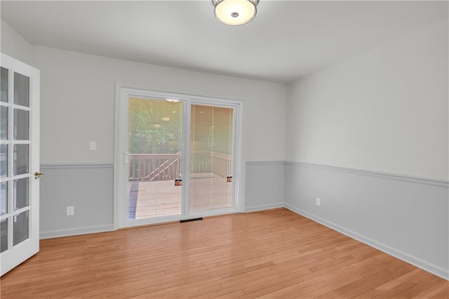 4331 E Kings Point Cir, Dunwoody, GA 30338 - empty room with light wood-style flooring and baseboards