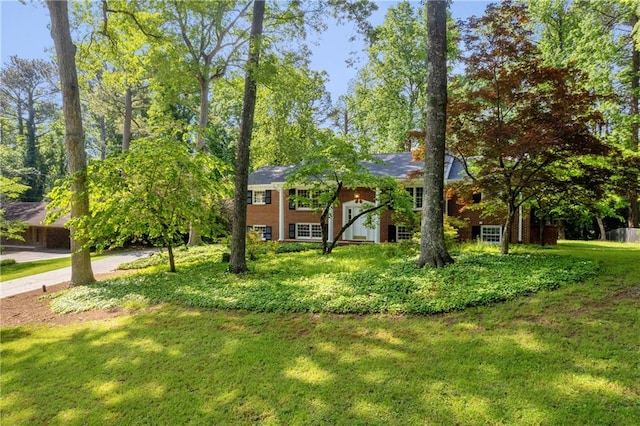 4331 E Kings Point Cir, Dunwoody, GA 30338 - view of front of home with a front lawn