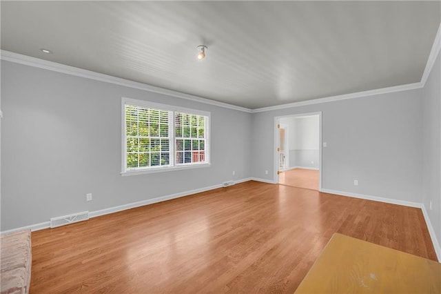 4331 E Kings Point Cir, Dunwoody, GA 30338 - spare room featuring crown molding, wood finished floors, and baseboards