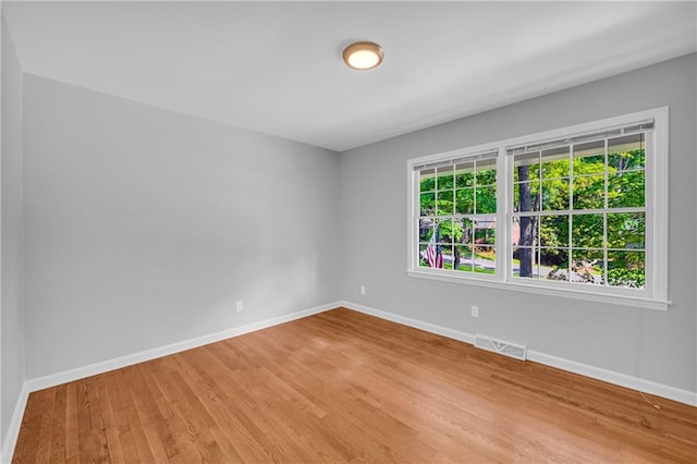 4331 E Kings Point Cir, Dunwoody, GA 30338 - empty room featuring baseboards and light wood-style flooring