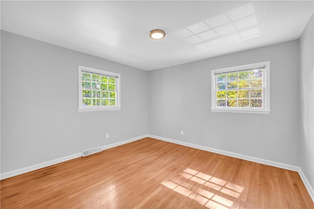 4331 E Kings Point Cir, Dunwoody, GA 30338 - empty room with baseboards and light wood-style flooring