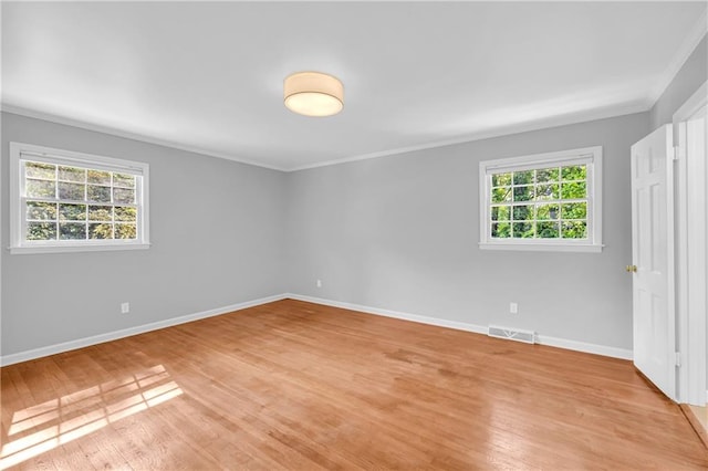 4331 E Kings Point Cir, Dunwoody, GA 30338 - unfurnished bedroom with ornamental molding, light wood-style flooring, and baseboards