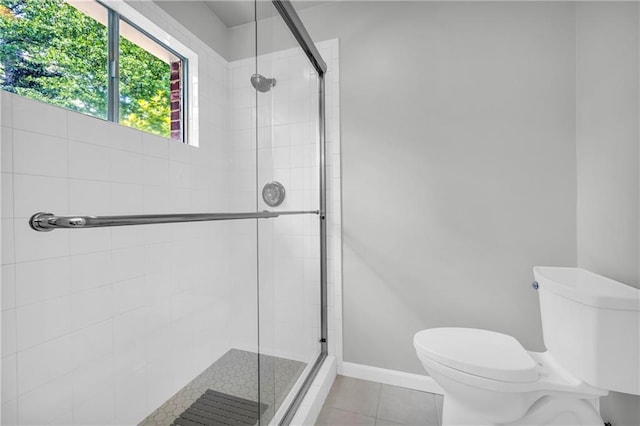 4331 E Kings Point Cir, Dunwoody, GA 30338 - bathroom with a shower stall, toilet, and tile patterned flooring