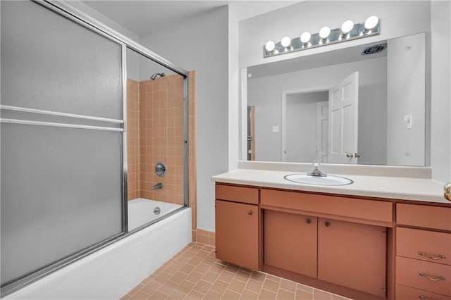 4331 E Kings Point Cir, Dunwoody, GA 30338 - bathroom featuring combined bath / shower with glass door, vanity, and tile patterned flooring